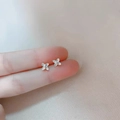 Delicate 925 sterling silver four-petal flower stud earrings with a matte brushed finish - Windmill Flower / Silver