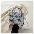 Mini borsa tote bianca con stampa a farfalla blu e stelle in ecopelle con tracolla - Blu