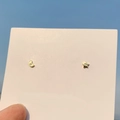 Gold star and moon stud earrings with small inset diamonds held against a blue sky - 925 Silver Needle / Gold Star Moon