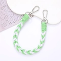 Close-up of green and white braided phone wrist strap with silver metal spring clasps - 12mm Width / Green