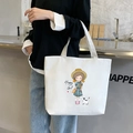 Casual canvas tote bag for women, large capacity shoulder handbag with cute cartoon girl print. - Happy Girl / White