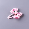 Pink ribbon bow hair clip for girls with strawberry and white polka dot pattern - Strawberry Style