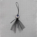 Dettaglio decorazione occhio di Halloween con venature rosse e gonna in tulle nero - Nero