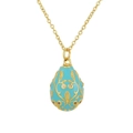 Gold necklace with turquoise enamel egg pendant featuring gold vine motifs and gems - Lake Blue