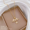 Détails du collier étoile ailes d'ange doré avec dimensions 2,5x2,2cm et poids 3,6g - C241 Collier (Chaîne en Acier Titane Pendentif en Cuivre)
