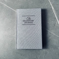 A5 linen cover gratitude journal in light grey fabric with elegant lettering - Gray