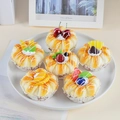 Set of 6 realistic artificial PU cupcakes with faux fruit toppings in a white ceramic dish - 6-Piece Set
