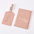 Detailed view of pink PU leather passport cover and luggage tag with gold foil lettering - Pink