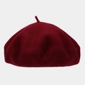 Macro detail of wine red wool beret fabric texture and top stem decoration - One Size / Burgundy