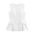 Detail view of a white sleeveless round neck top with peplum hem and two front pockets - S / White