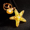 Golden starfish keychain with crystals, pearl shell pendant, and yellow charms - Single OPP Bag Packaging / Yellow Jelly Small Starfish