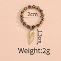 Detailed view of elastic beaded ring featuring golden charms and 2cm inner diameter - Multicolor Bead Wing Style (F-R584)