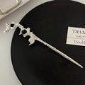 Artistic silver textured hair pin with black gemstones on minimalist dark tray - Irregular Black Rhinestone