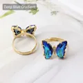 Adjustable golden butterfly ring featuring deep blue gradient crystal and zircon accents - Dark Blue Gradient