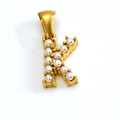 Golden stainless steel letter K pendant necklace with inlaid white pearls on white background - Letter K