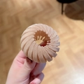 Beige matte bird nest hair ring featuring elastic spiral structure and velvet texture - Velvet Khaki