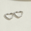 Polished silver heart hoop earrings with mirror finish and hinged clasp closure - Heart Earrings / Platinum Color