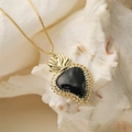 Vintage heart pendant necklace with black enamel crown and gold chain on sea shell - Black