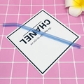 Single curved blue heat-resistant borosilicate glass straw on a minimalist card - 8*200mm / Light Blue Bent
