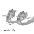 Detailed view of silver stainless steel C-shaped earrings with textured surface and 29mm height - Silver Style (TE6501-S)