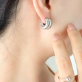 Minimalist double-layered silver C-shape hoop earrings with a high-polished mirror finish - Steel