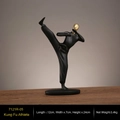 Statue d'artiste martial minimaliste en résine noire avec tête dorée en position de kick - Athlète de Kung Fu - Tête Dorée