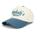 Dettaglio cappello trucker blu e beige con ricamo 3D Somebody's Problem - Regolabile / Blu Lago