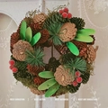 Rustic Christmas wreath featuring natural pine cones, red berries and lush greenery decoration - Sijin Small