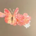 Handmade butterfly and flower hair clip in pink and orange tones with metal duckbill base - Sunset Red Butterfly Flower Claw Clip