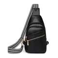 Black leather crossbody chest bag with decorative black and white woven strap and gold zippers - Black