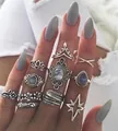 Bohemian style 10-piece ring set with vintage silver finish and turquoise accents - 10-Piece Lotus Feather Star