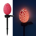 Solar powered lawn light with red glowing dinosaur egg design and ground stake - Easter Egg Stake (Red)