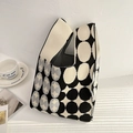 Minimalist knit tote bag featuring a bold black and white geometric circle pattern - Black Rice Dots