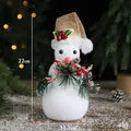 White flocked snowman figurine with red bell and pinecone decor, 22cm height - 22x13.5cm