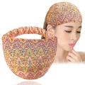 Fascia larga etnica con motivi a onde colorate su modella e foto del prodotto - Arancione