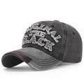 Dark grey washed cotton baseball cap featuring embroidered BLACK patch and leather brim - Black with Light Grey Brim