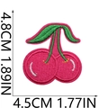 Detailed embroidery patch of a pink cherry with green leaves and precise stitching - No.38-Emoticon Cherry