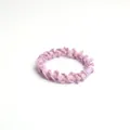 Elastic threaded hair tie in light purple and beige patchwork with a wavy edge design - Purple