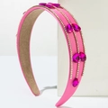 Detail of rose pink satin headband with parallel rhinestone rows and waterdrop gems - Rose Red