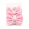 Set of two pink waffle texture bow hair clips on display card for little girls - Light Pink