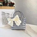 Macro detail of hand-woven geometric bag with a decorative oversized creamy white bow - Small (With Cream Bow) / Navy Blue White