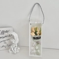 Elegant gift box featuring cream-colored soap roses and green foliage in a transparent case - Rose Champagne With Gift Box