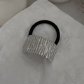 Black elastic ponytail holder featuring a chunky silver rectangle with a ripple texture - 00616-Ripple Buckle-Silver