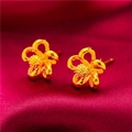 Gold-plated floral stud earrings with a matte and polished finish on red silk background - Style 15 Layered Petal Stud Earrings (1 Pair With Backs)