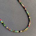 Handmade beaded necklace with multicolored natural stone cylinders and gold metal spacers - 16#
