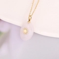 Close-up of gold chain necklace with oval pink stone pendant and sun motif detail - Pink Oval Sun (11#)