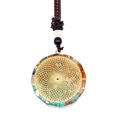 Macro detail of round crystal pendant with colorful stones and golden metal disc - Golden Geometric Hollow Style (3-6)