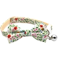 Detailed view of floral pet collar with fabric bow and silver bell on white background - Bowknot Style / Red Floral