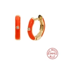 Macro detail of 925 sterling silver hoop earrings with orange enamel and crystal stones - Orange