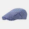 Close-up of the woven geometric triangle pattern and texture on the flat cap - M (56-58cm) / Blue